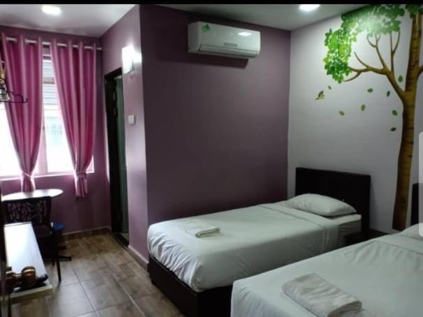 Purple Dream Home Teluk Panglima Garang Værelse billede
